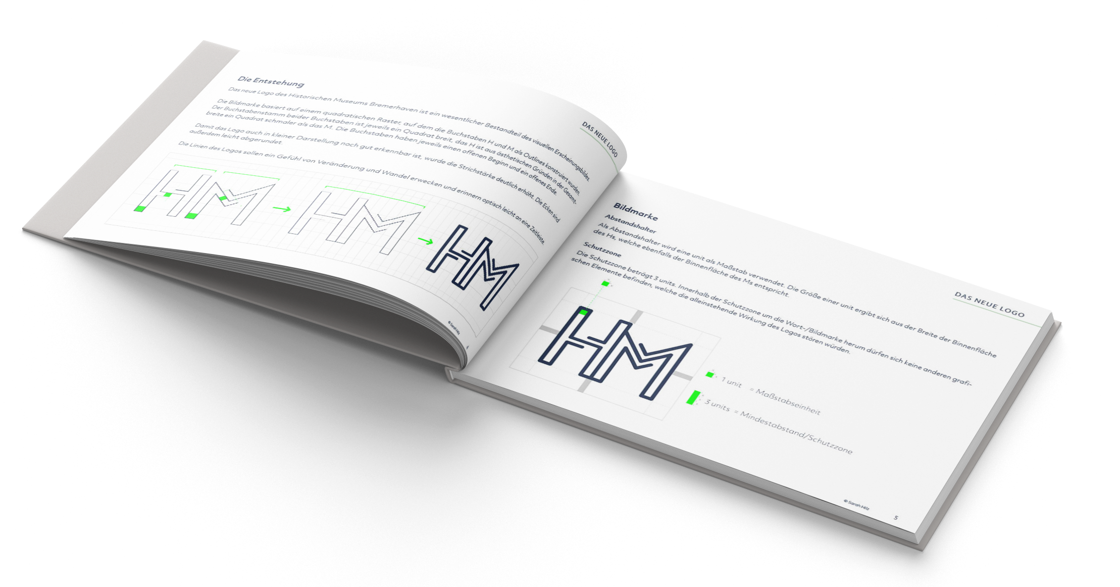 Opened Design manual book showing the pages of the logo creation