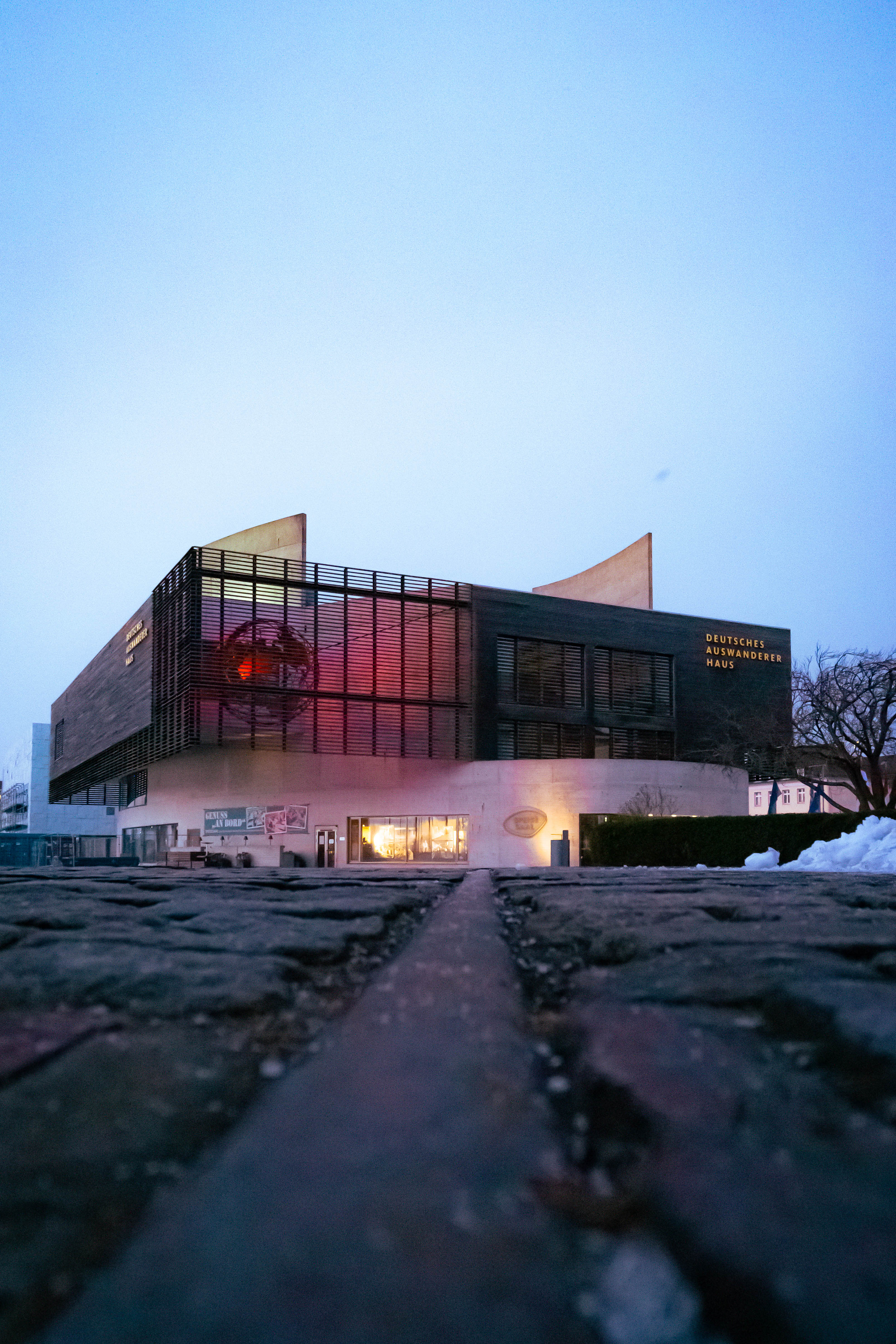 Deutsches Auswandererhaus in Bremerhaven. Shot from below, red lighted globe in the building